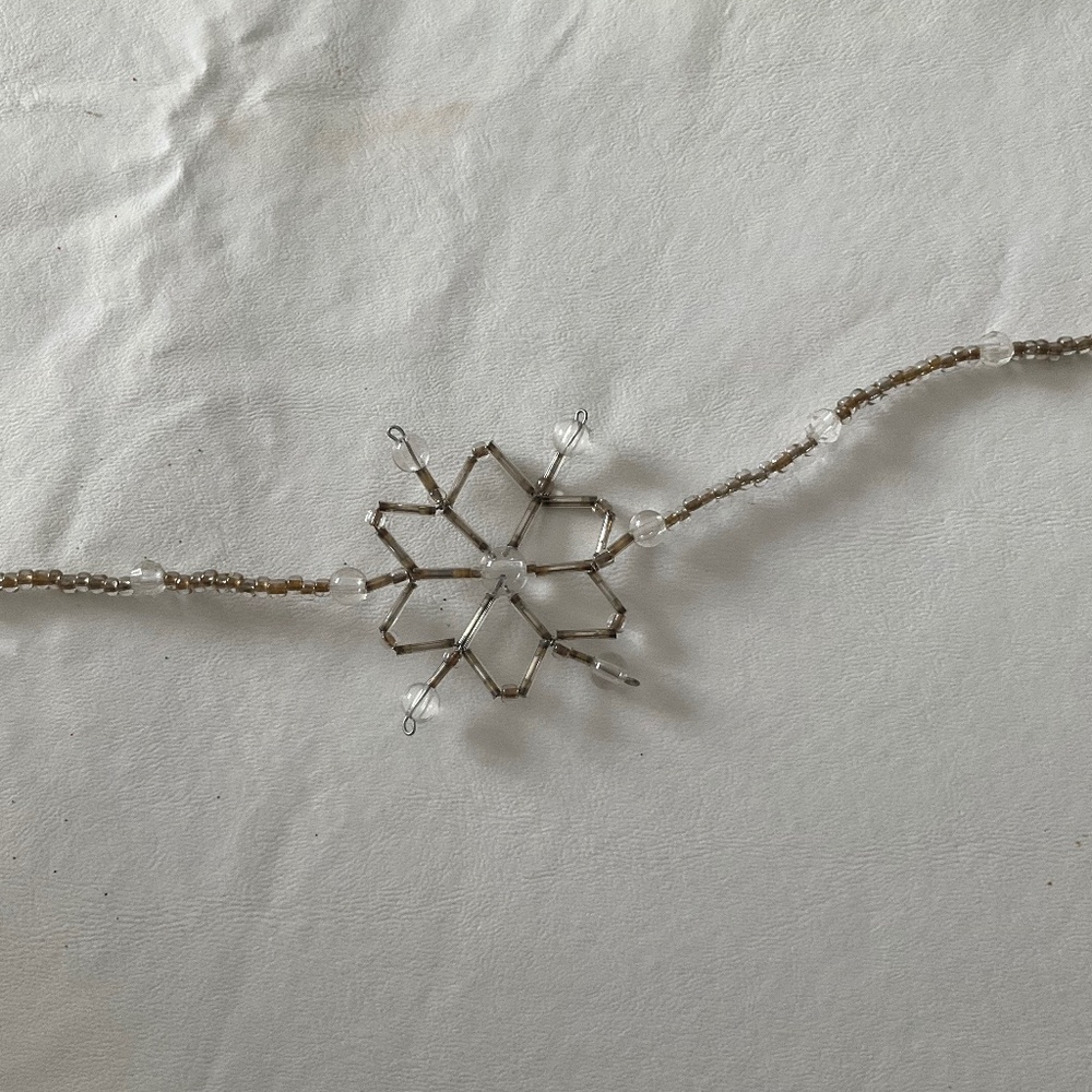 8 1/2 ft silver, plastic, and glass garland, set of 2